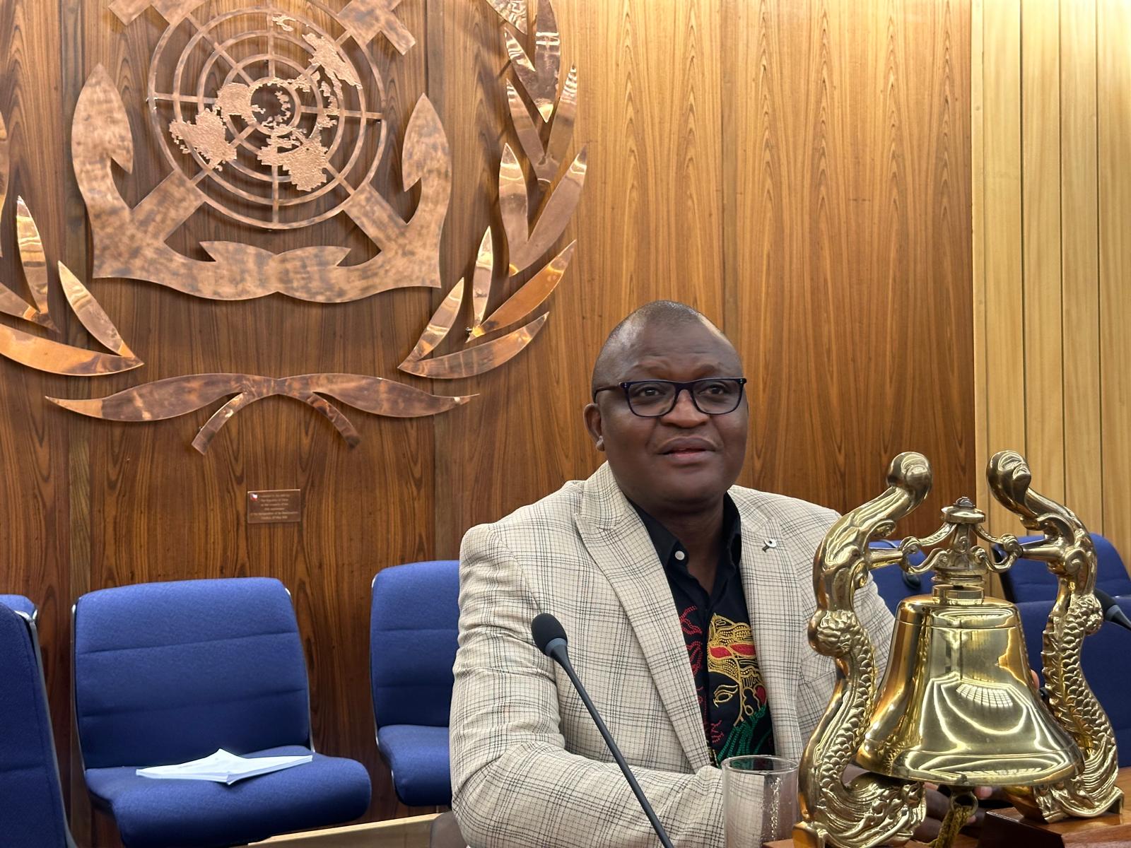 Yaknan Foundation founder seated at an international maritime forum